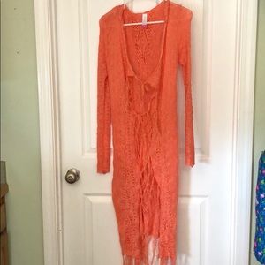 Long hooded sweater. Med. looks orange but peach